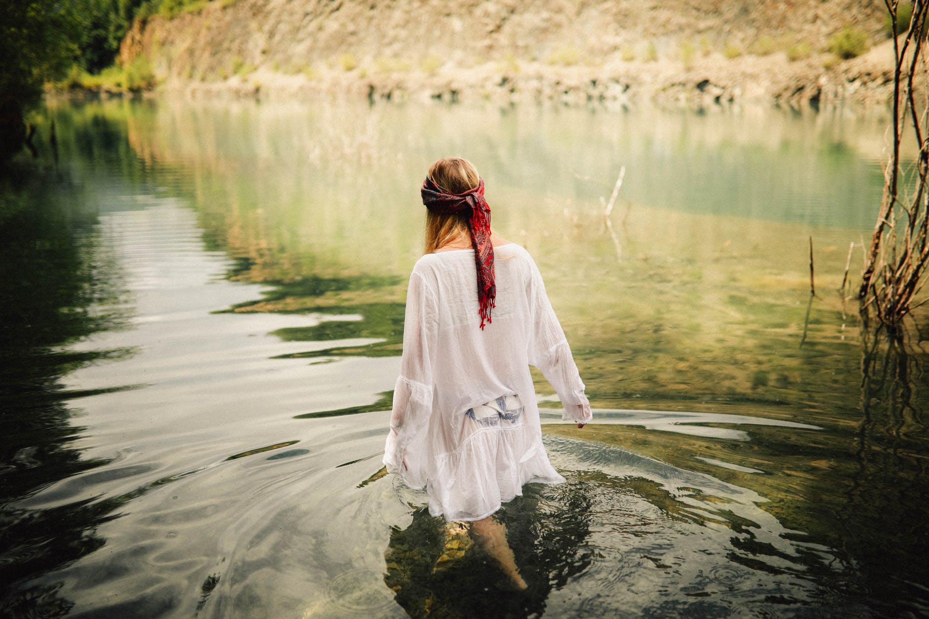 woman walking on body of water